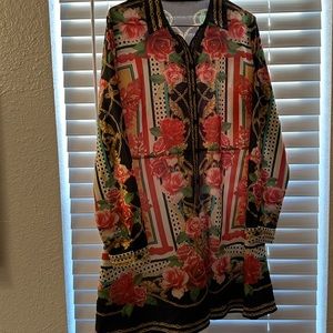 Dress. Missing small black belt to go around waist of dress.